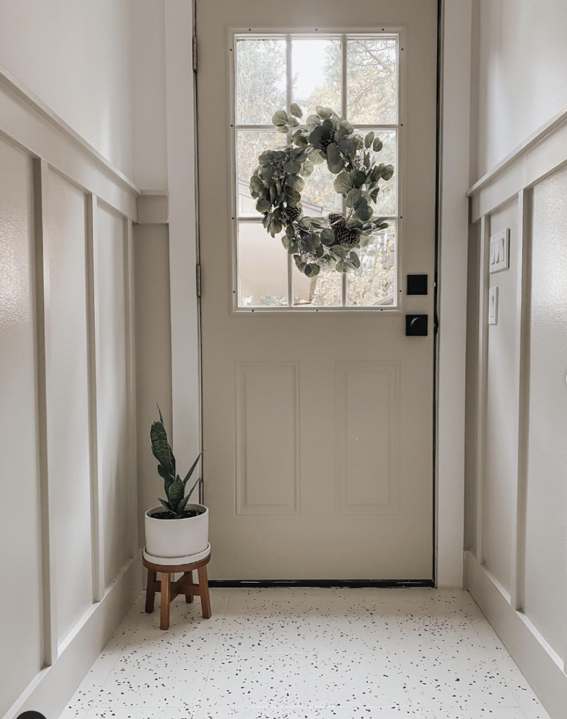 Entryway Flooring with a Beige Door