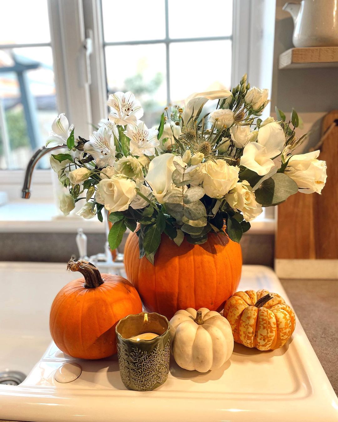 Elegant White Floral Pumpkin Arrangement