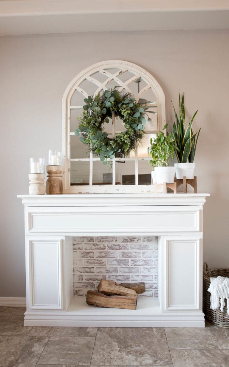 Faux fireplace with a faux brick back