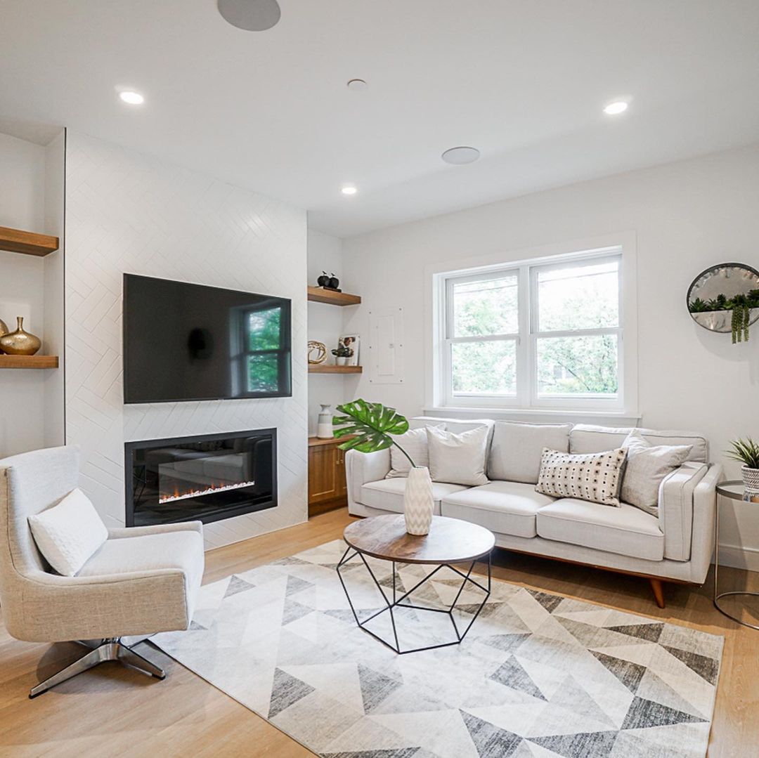Fireplace Flanked by Built-In Shelves