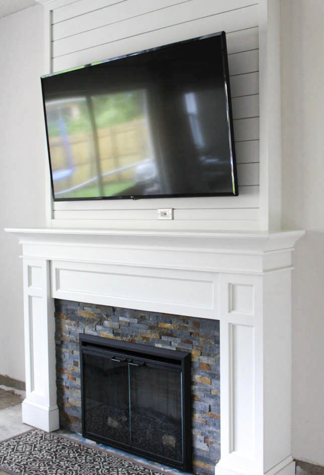 Fireplace with concealed storage
