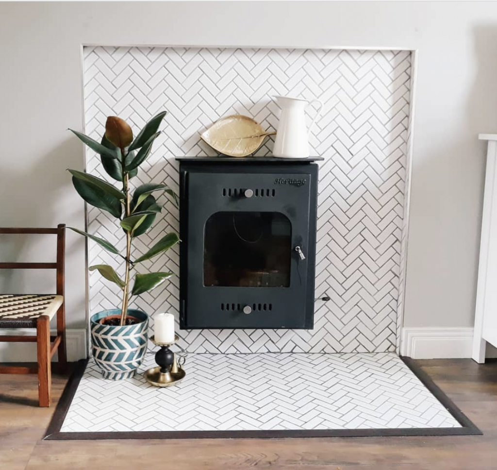 Fireplace with Subway Tile Herringbone Wall and Matching Tile Hearth