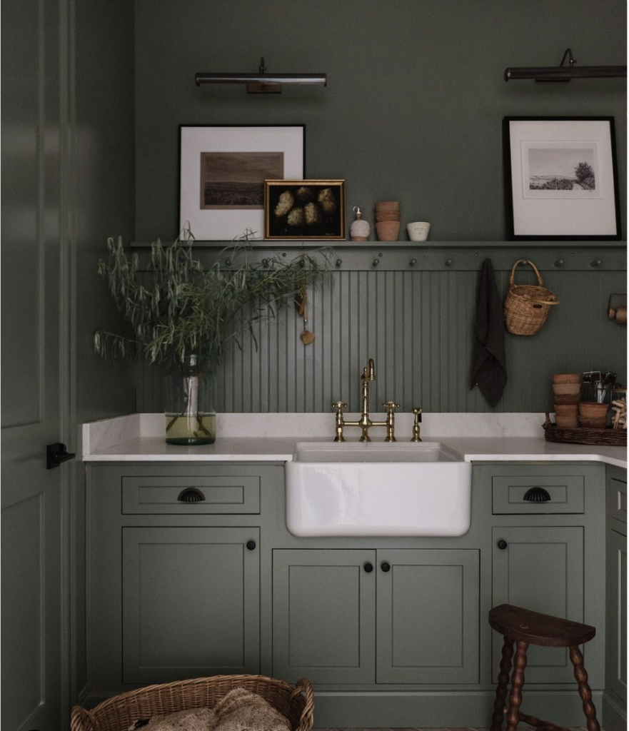 Flat Baseboards in a Green Laundry Room