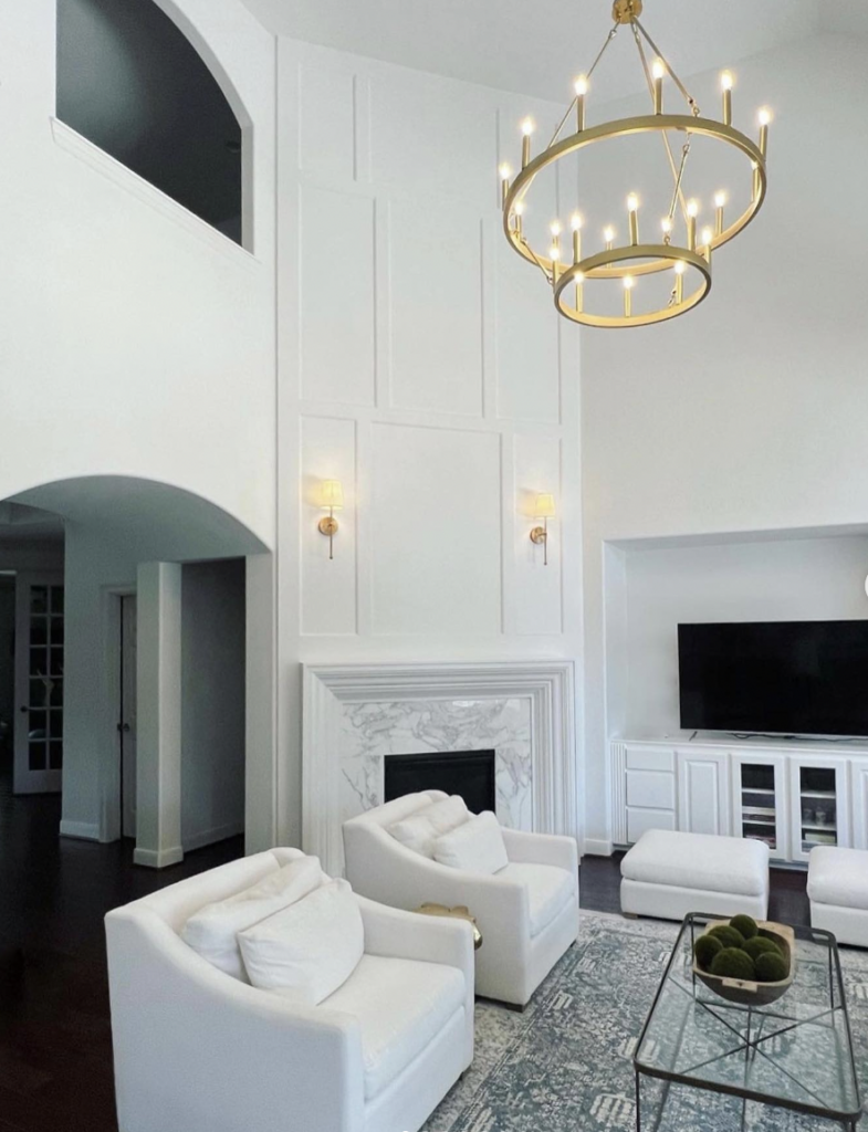 Gold Chandelier and Board-and-Batten Fireplace Setting