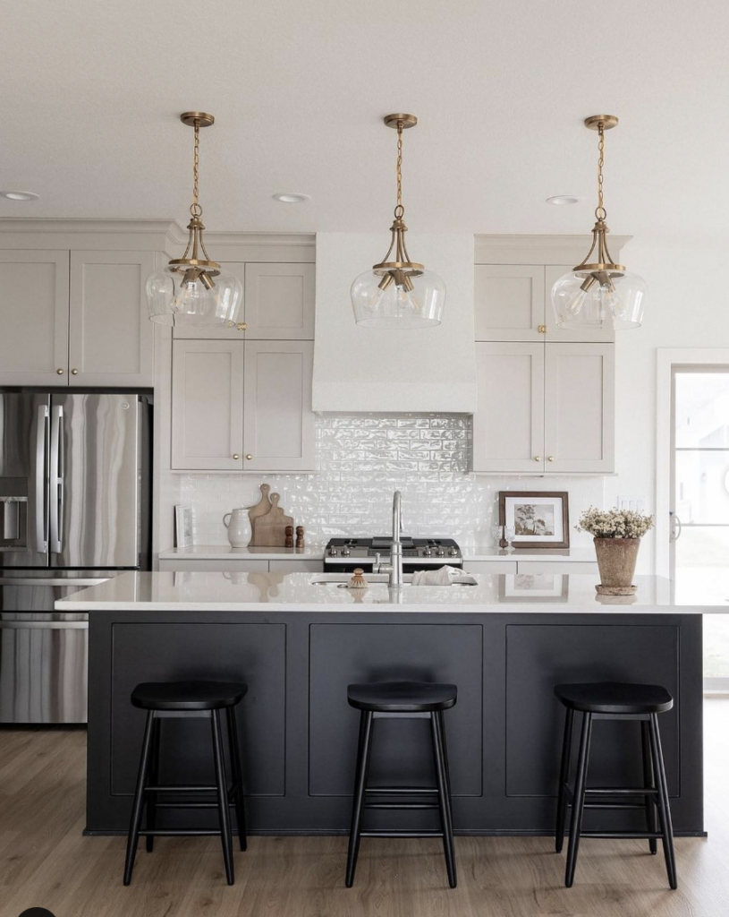 Gold Fixtures Above the Kitchen Sink