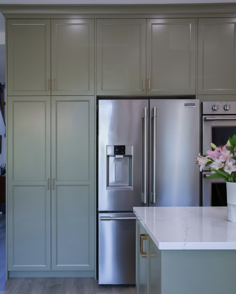 Gold Hardware on Green Cabinets Over the Fridge