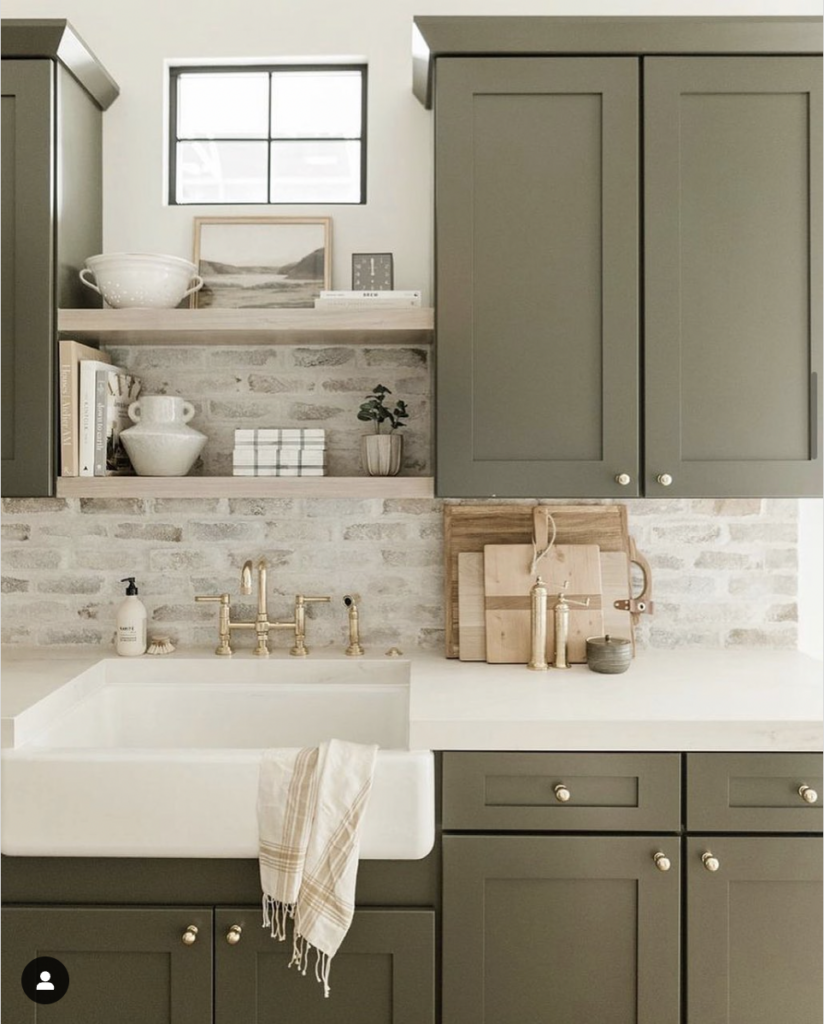 Green Kitchen Cabinetry and Stone Backsplash