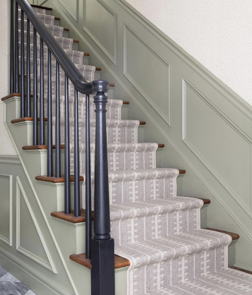 Green Steps with Wood Risers and Black Railing
