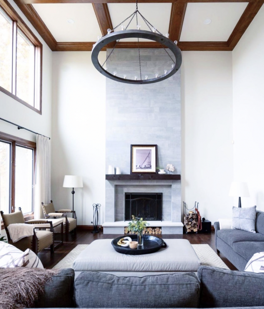 Grey Fireplace Wall and Tall Neutral Ceiling
