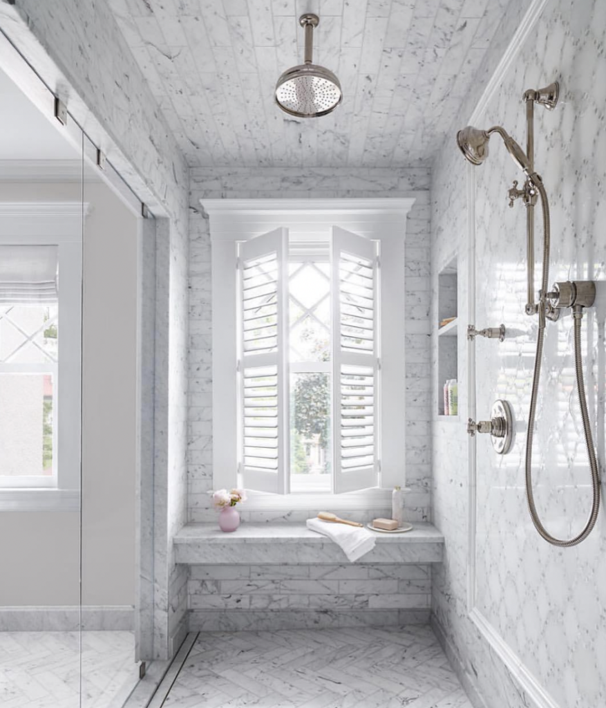 Grey Herringbone Tile Flooring With Floating Tile Bench