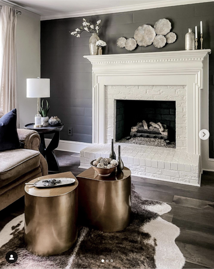 Grey Wall with White Fireplace and Brick Hearth