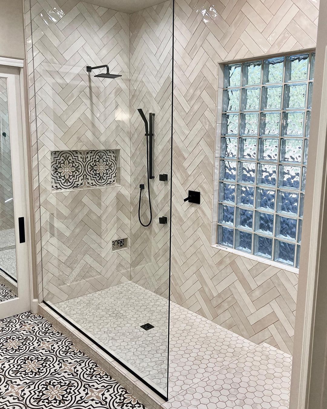 Herringbone Tile Shower Pan with Ornate Niche