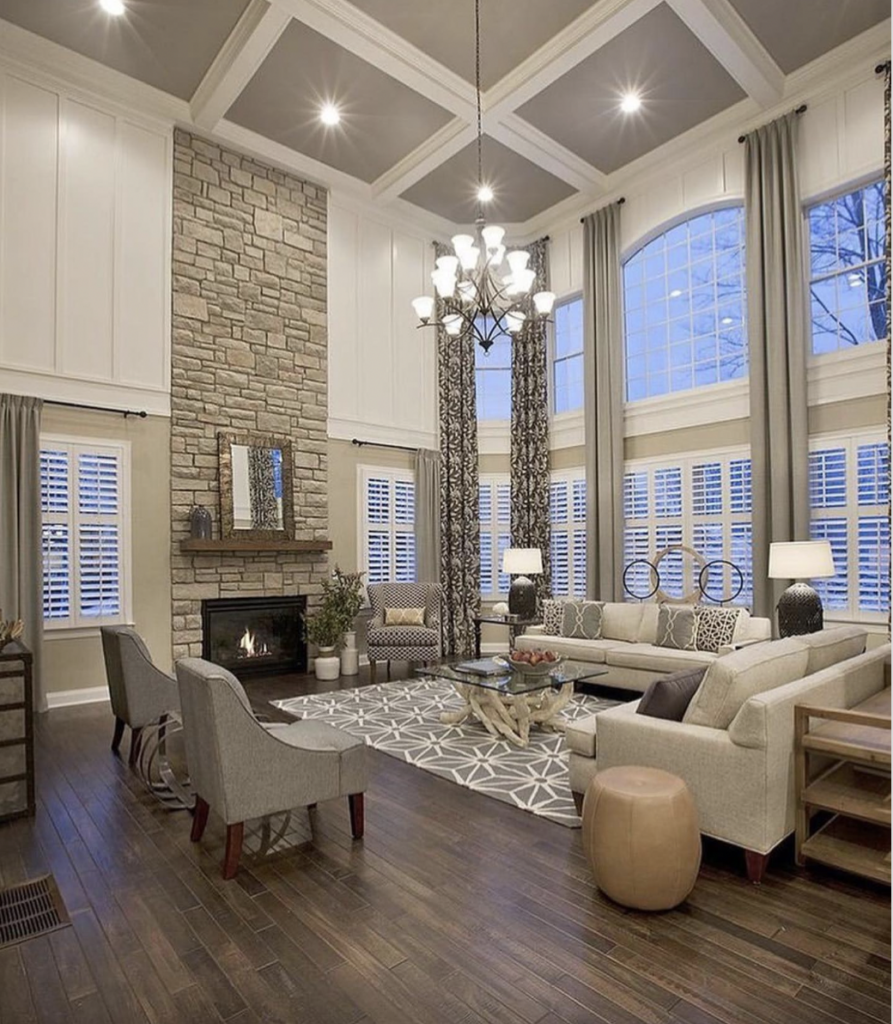 High Ceilings Above a Stone Fireplace Wall