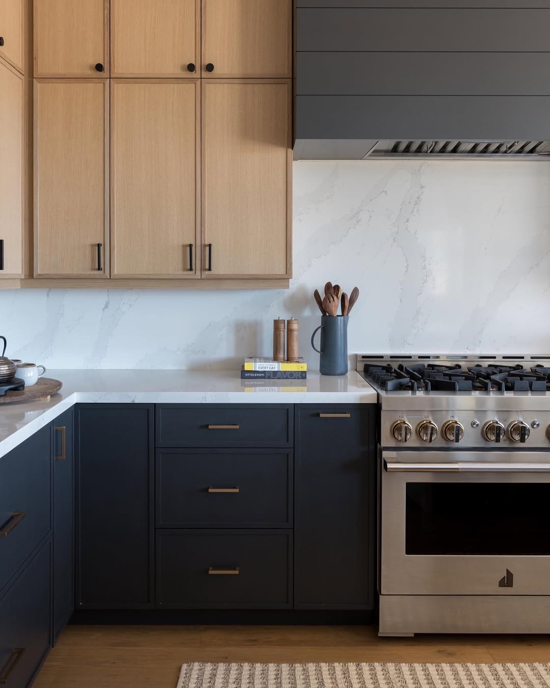 High Energy Black Kitchen with Brass Hardware
