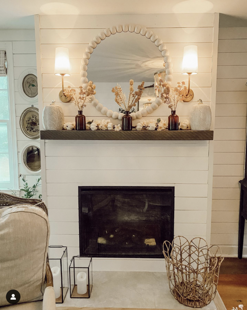 Horizontal White Shiplap Fireplace and Multiple Wall Lights