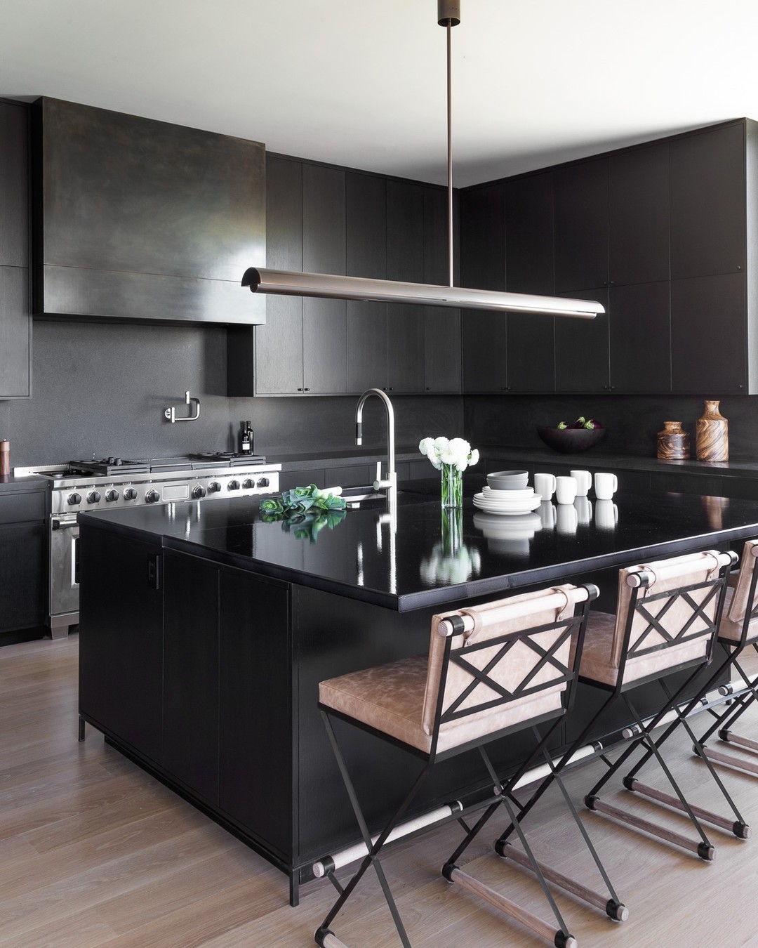 Industrial Kitchen with a Black Island