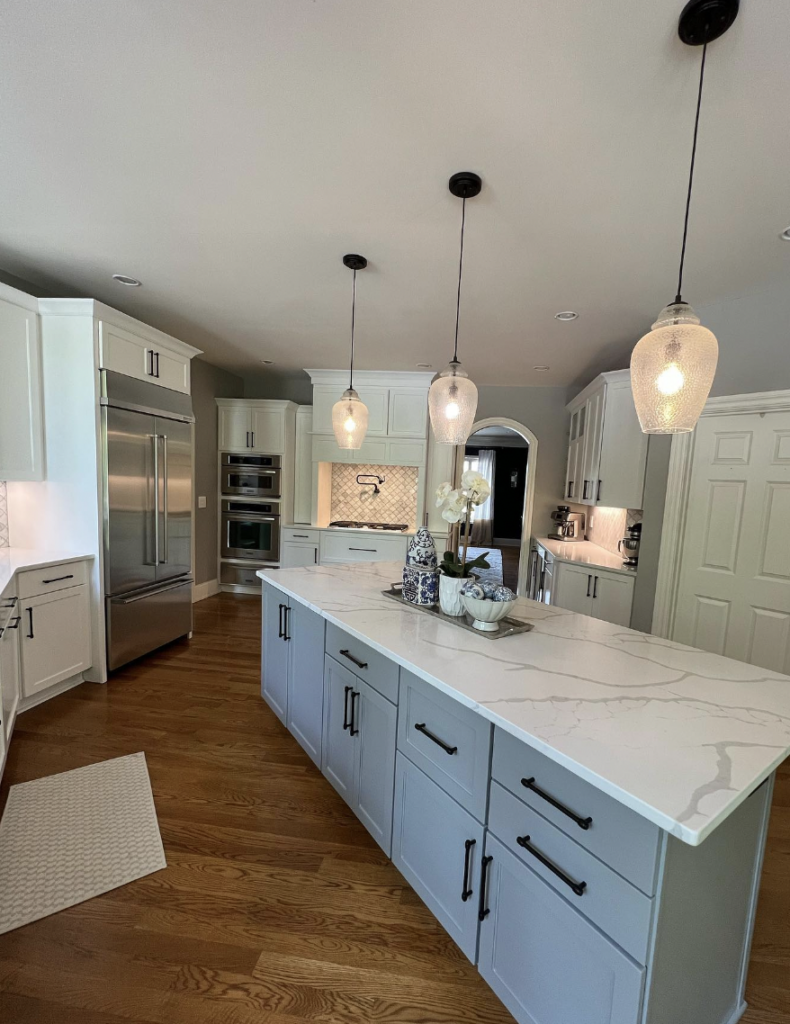 Kitchen Cabinets in Two Tones With Crown Moulding