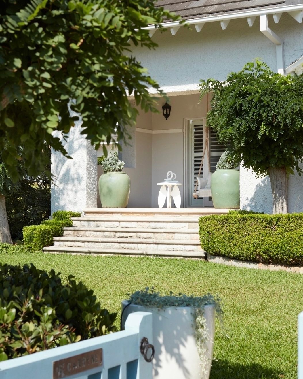 Large Entrance Planters Paired with Stone Steps