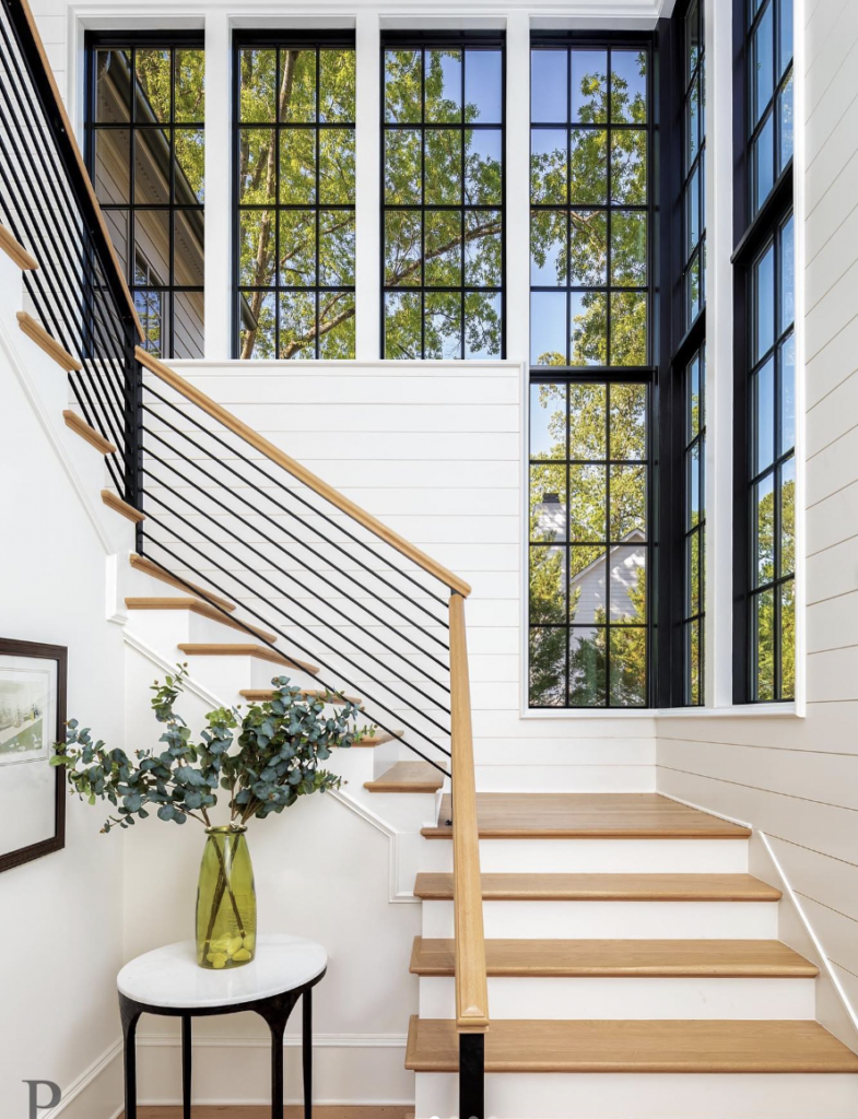 Large Windows and a White Wood Staircase