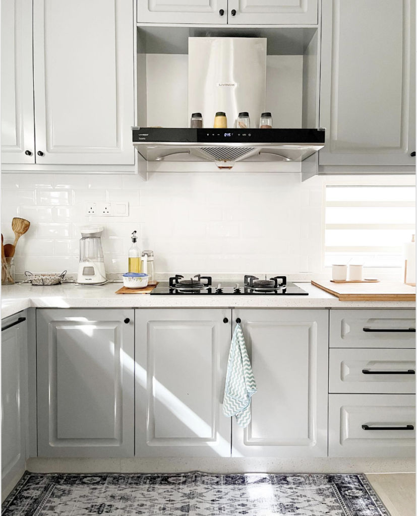 Light Gray Kitchen Cabinets and a White Tile Backsplash