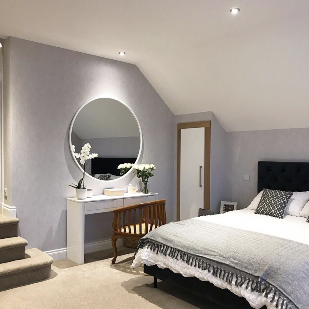 Light Grey Bedroom Accent Wall with White Mirrors