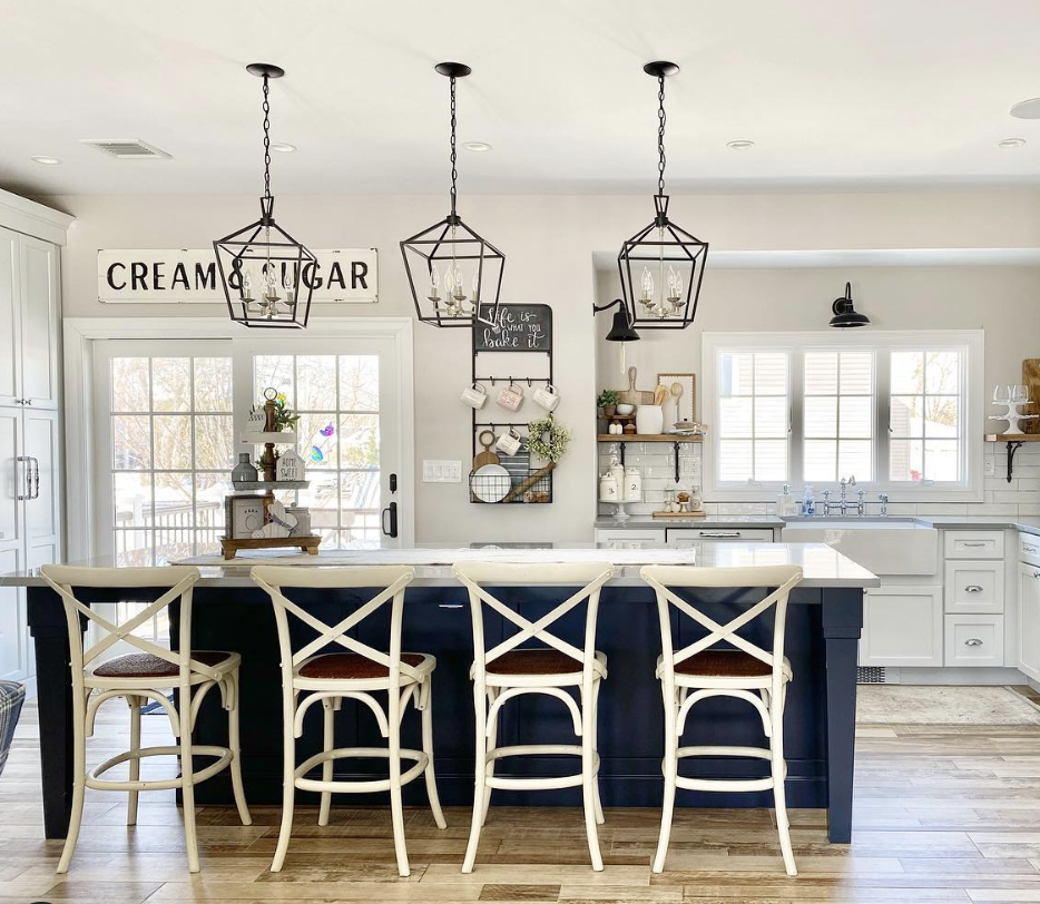 Light Wood Floors beneath a Blue and White Kitchen