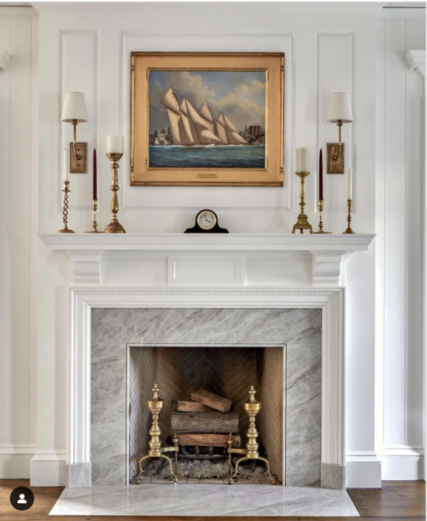 Marble hearth in off-white with a white fireplace