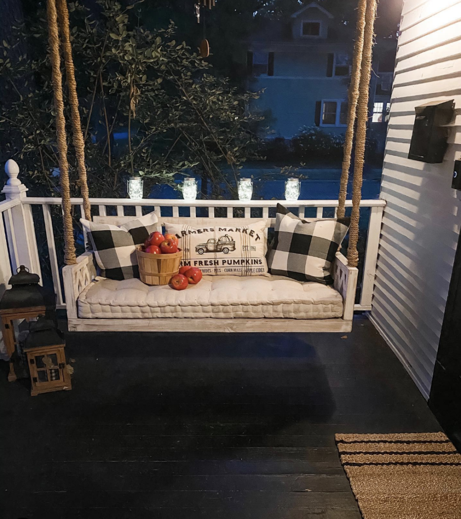 Metal Farmhouse Porch Railing and White Swing