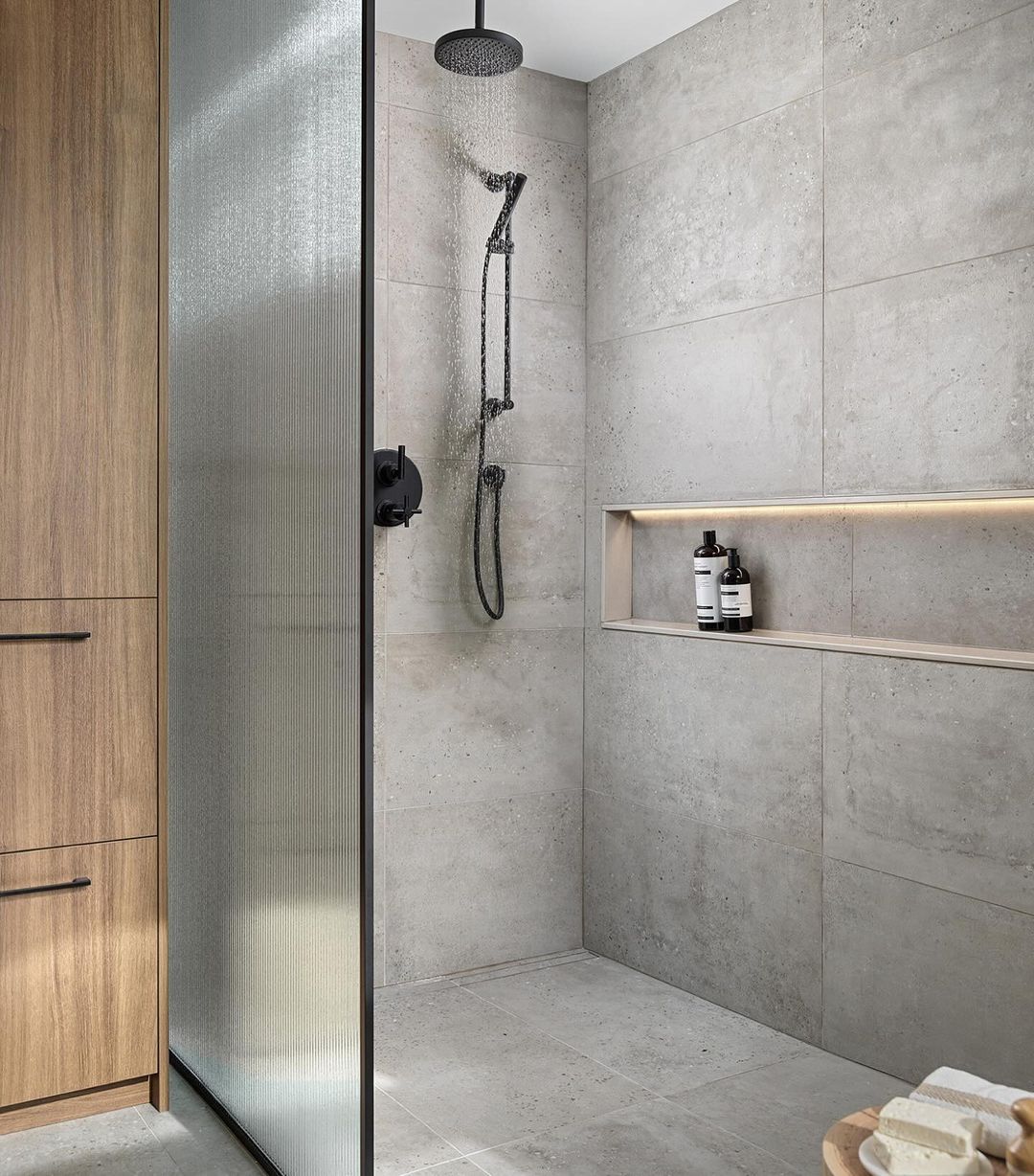 Sleek Concrete Shower Pan with Illuminated Niche