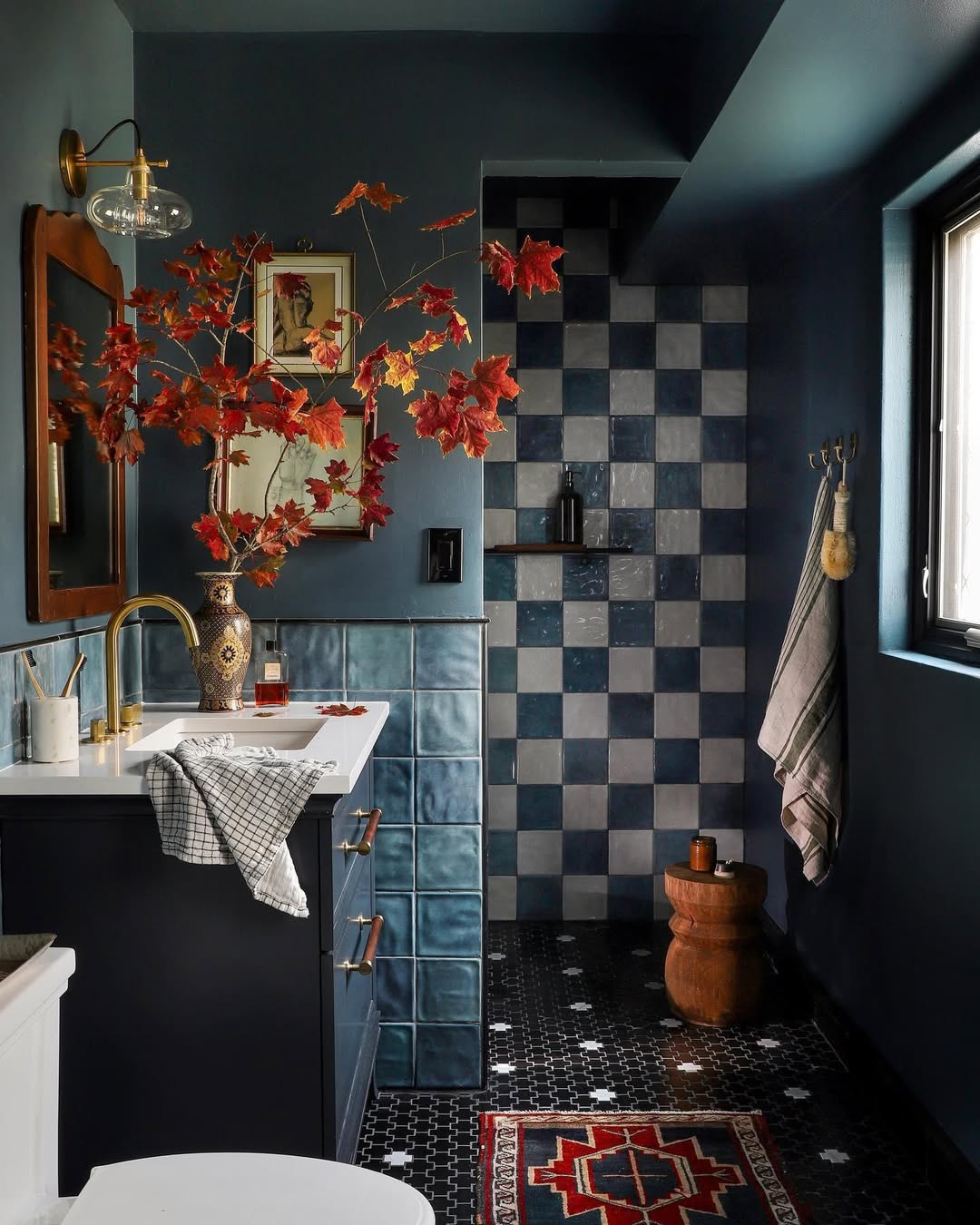 Moody Blue Bathroom with Fiery Leaves