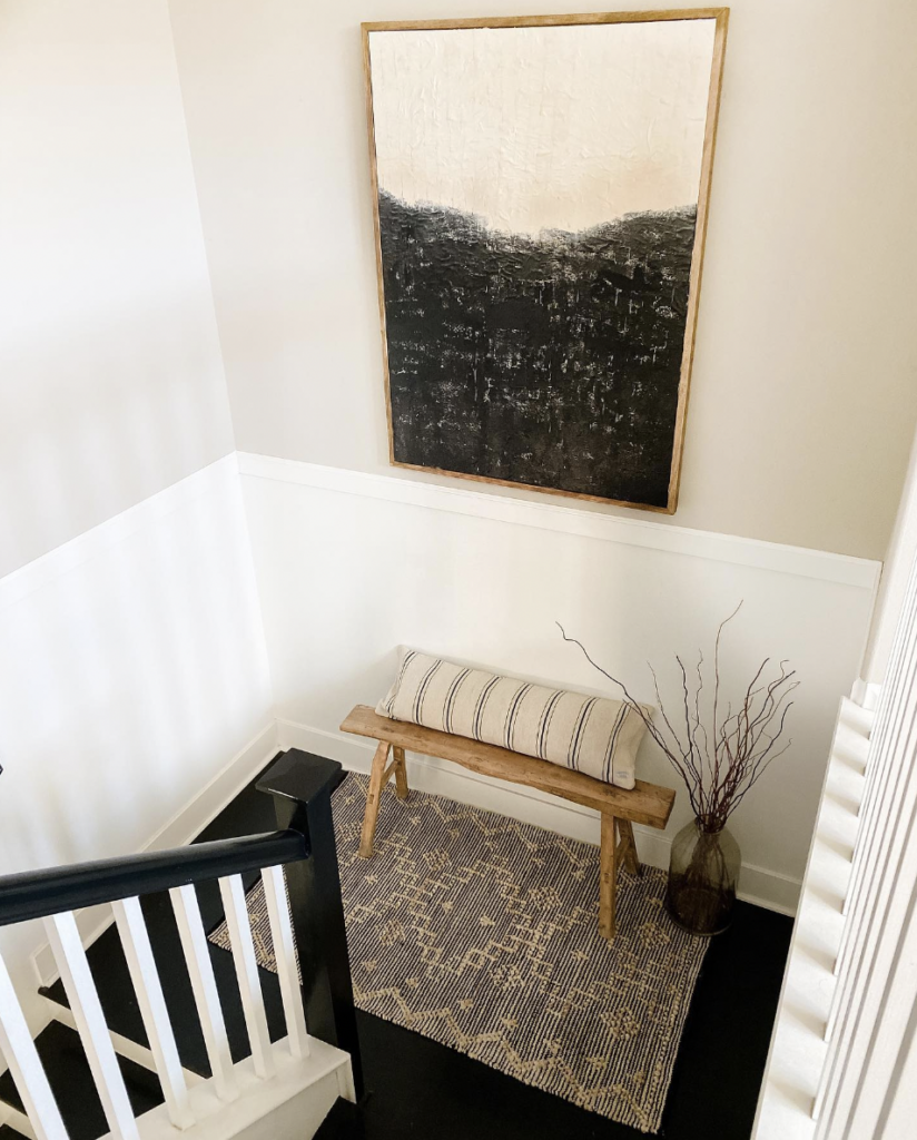 Natural Wood Seating for Sleek Black Stairs