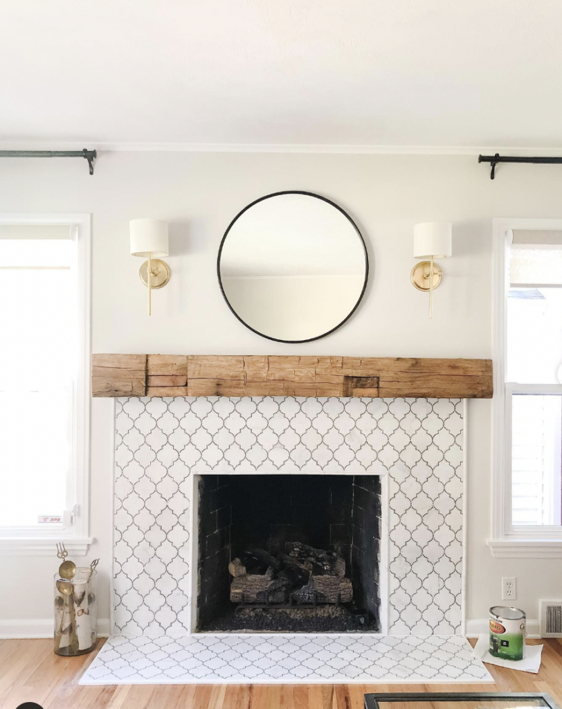 Natural Wood Shelves Beside a White Fireplace