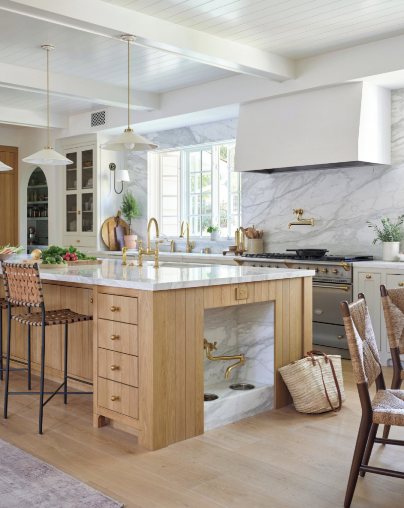 Over-Sink Light in an Open Marble Kitchen