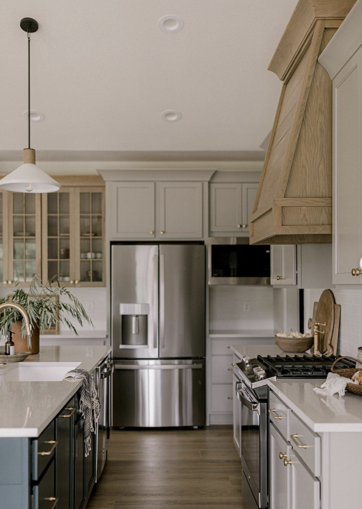 Over-Sink Sconce by a Stainless Steel Appliance