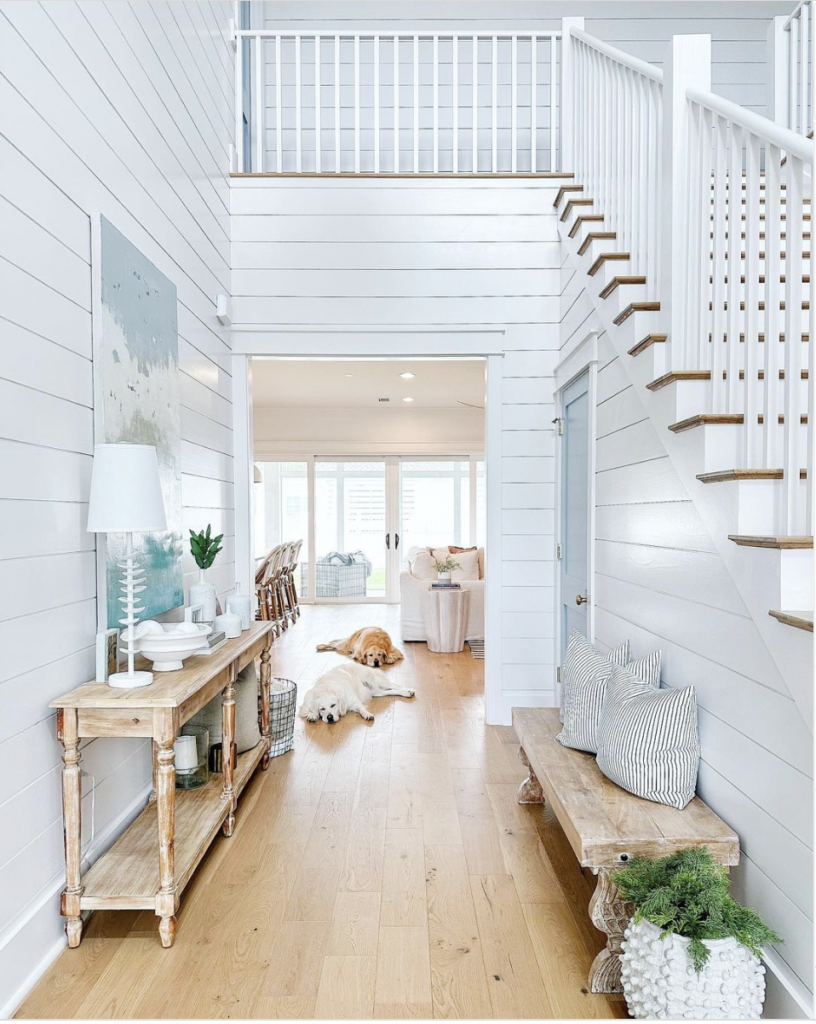White Shiplap Walls With Light Wood Flooring