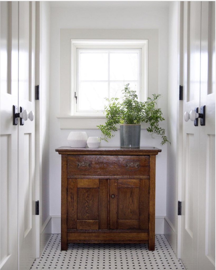 Patterned Tiles and White Baseboard Trim