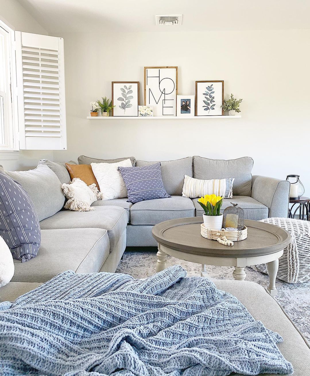 Comfortable Living Room with Personalized Picture Ledge Display