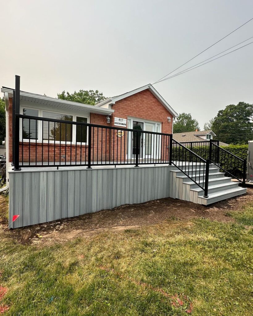 Red brick house with a black porch design