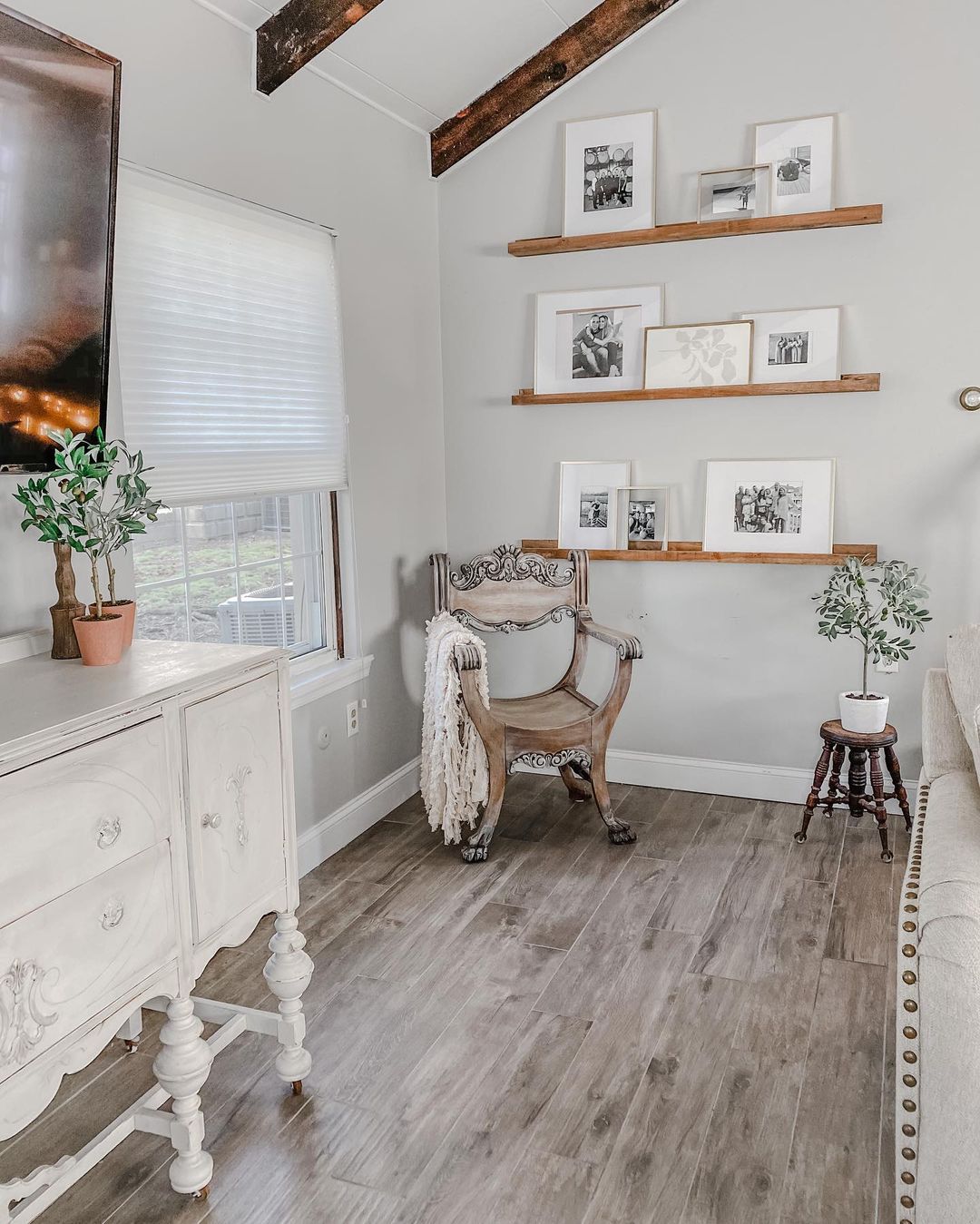 Rustic Living Room with Family-Focused Picture Ledge Display