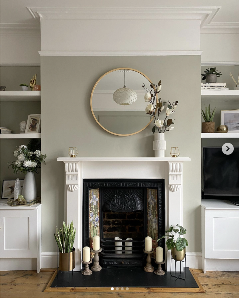 Sage Green Fireplace with Round Mirror