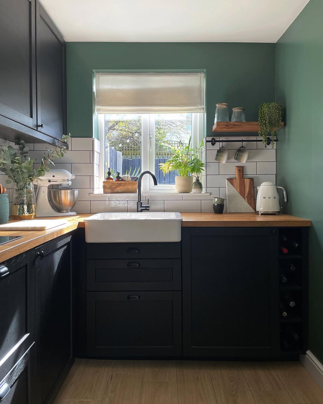 Sage Green Kitchen Walls with Sharp Linework and Soft Light