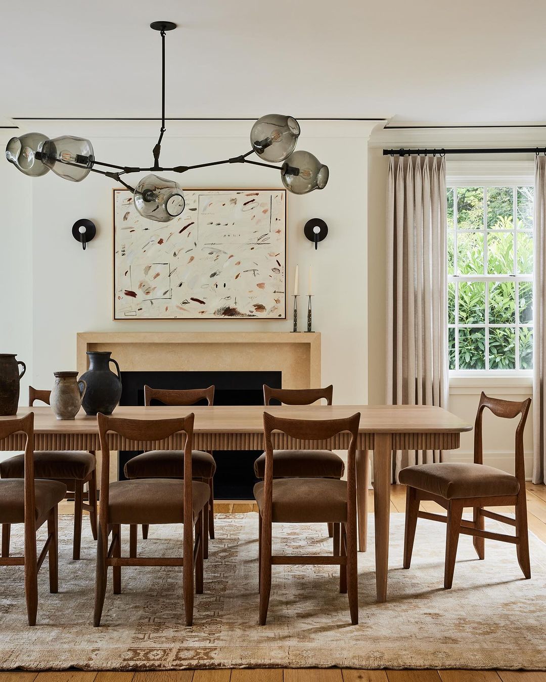 Modern Minimalist Dining Room with a Clean Fireplace