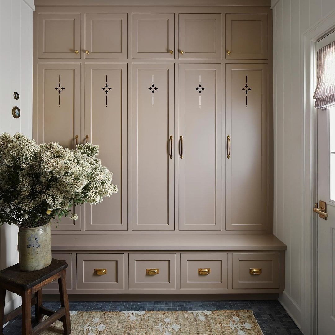 Serene Neutral Mudroom with Diamond Motifs and Gold Accents