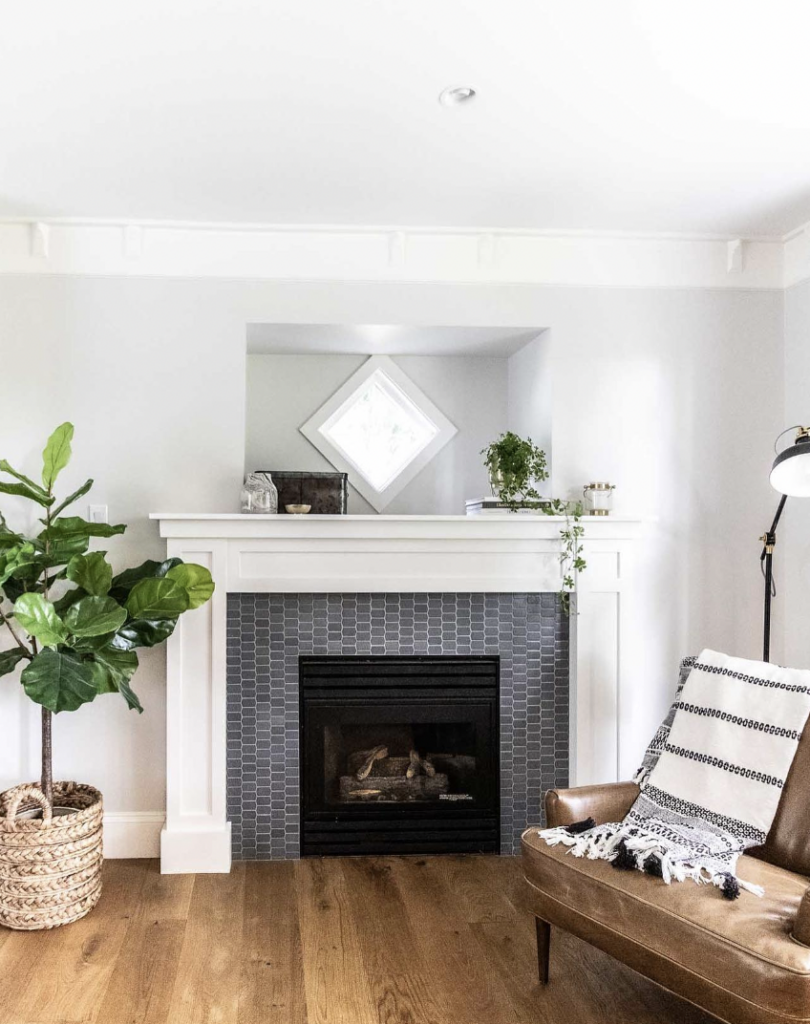 Small Dark Grey Tile and White Fireplace