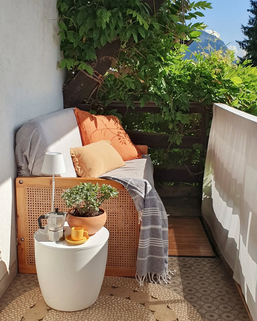 Cane-Panel Loveseat With Nature Views