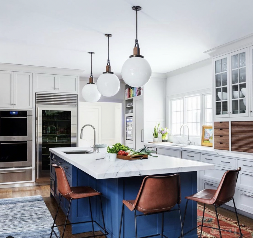 Stainless Steel Appliances with Off-White Kitchen Cabinets