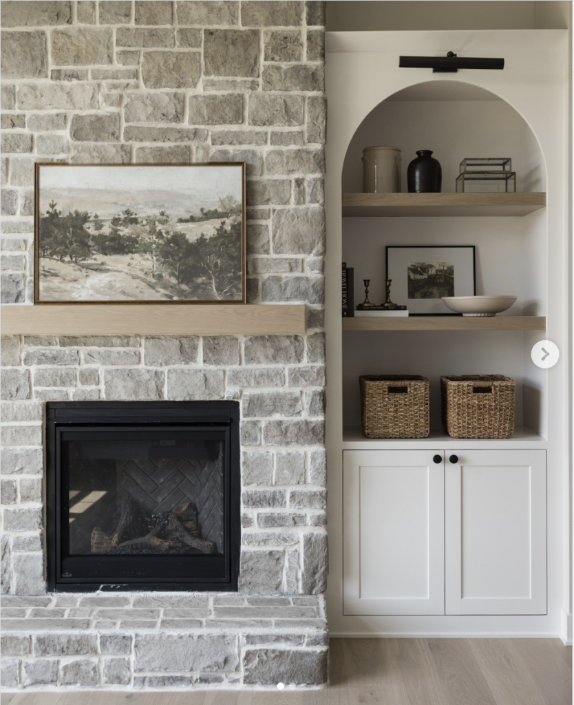 Stone accent wall around the fireplace