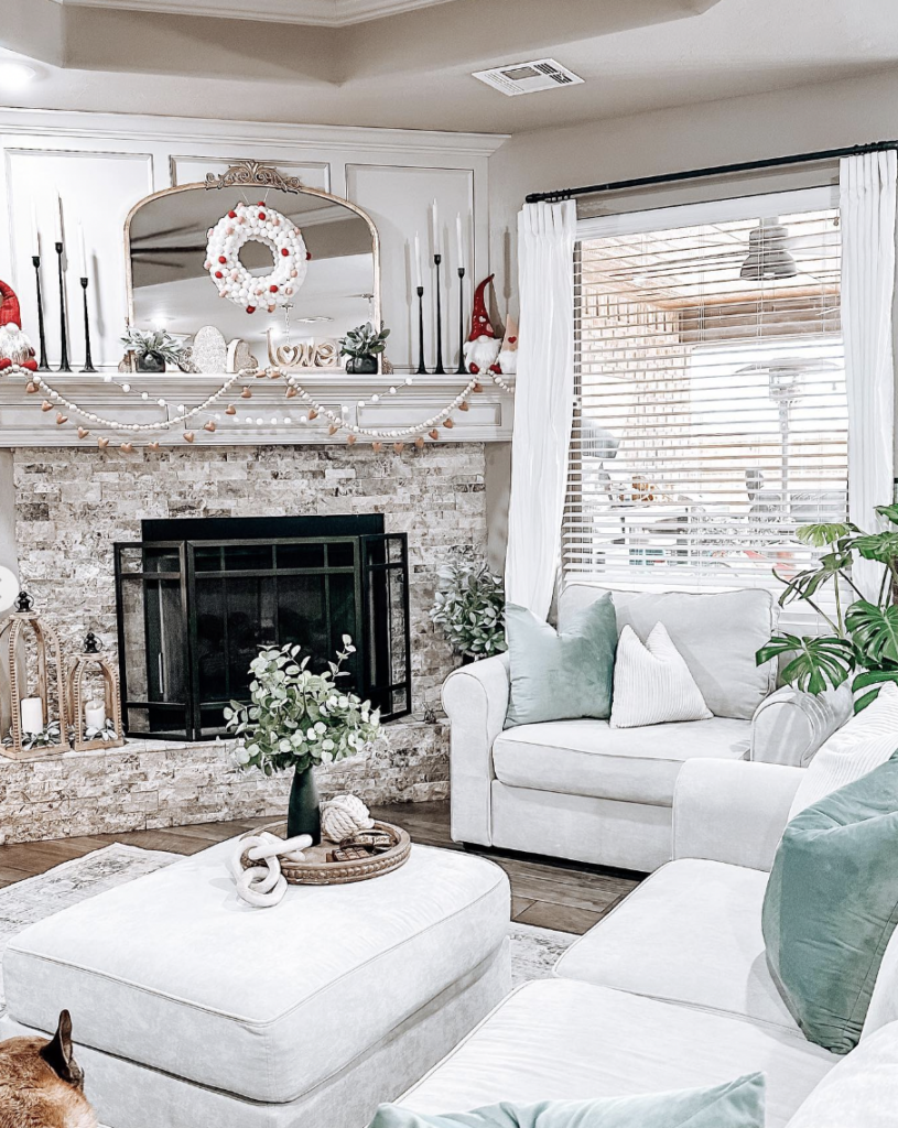 Stone Corner Fireplace with White Couch