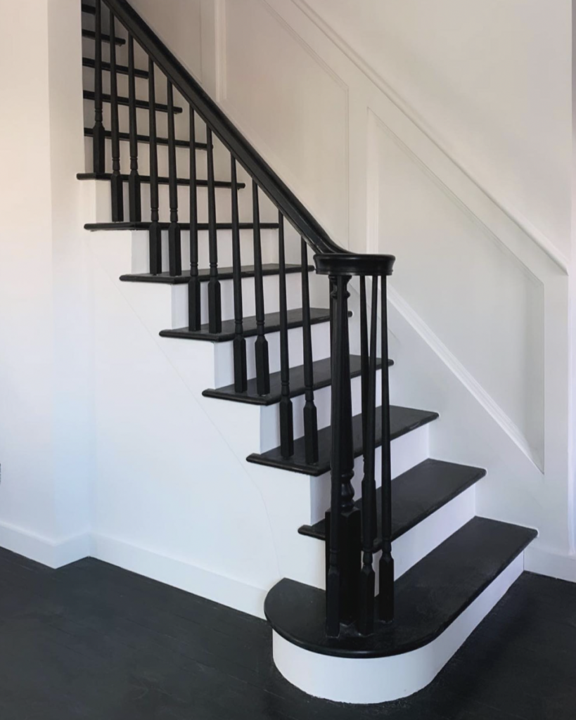 Subtle Texture Between Smooth Black Steps and White Walls