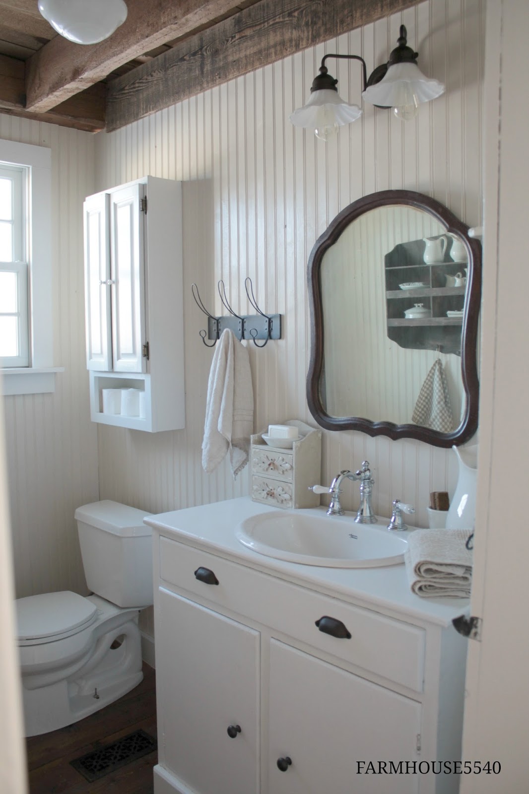 Traditional Farmhouse Powder Room with Beadboard